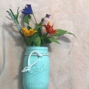 Mason jar vase with flowers